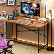 Lukzer Engineered Wood Study Table with X-Support Metal Frame & Adjustable Footpad (MST-009/Black & Oak Brown)