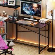 Lukzer Engineered Wood Study Table with X-Support Metal Frame & Adjustable Footpad (MST-009/Black & Black)