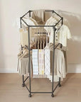 360° Rotating Hexagonal Clothes Drying Rack | Double Layer Metal Floor-Standing Coat Hanger with Wheels | Freestanding Storage Organizer for Bedroom, Balcony & Dorm – (White/Black)