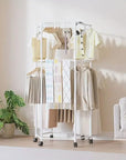 360° Rotating Hexagonal Clothes Drying Rack | Double Layer Metal Floor-Standing Coat Hanger with Wheels | Freestanding Storage Organizer for Bedroom, Balcony & Dorm – (White/Black)