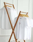 Lukzer X-Shape Bamboo Clothes Rack with Double Hanging Rods & Storage Shelf | Freestanding Garment Organizer Stand | Foldable, Durable, Multipurpose Clothing Rack for Bedroom, Hallway & Laundry Room.